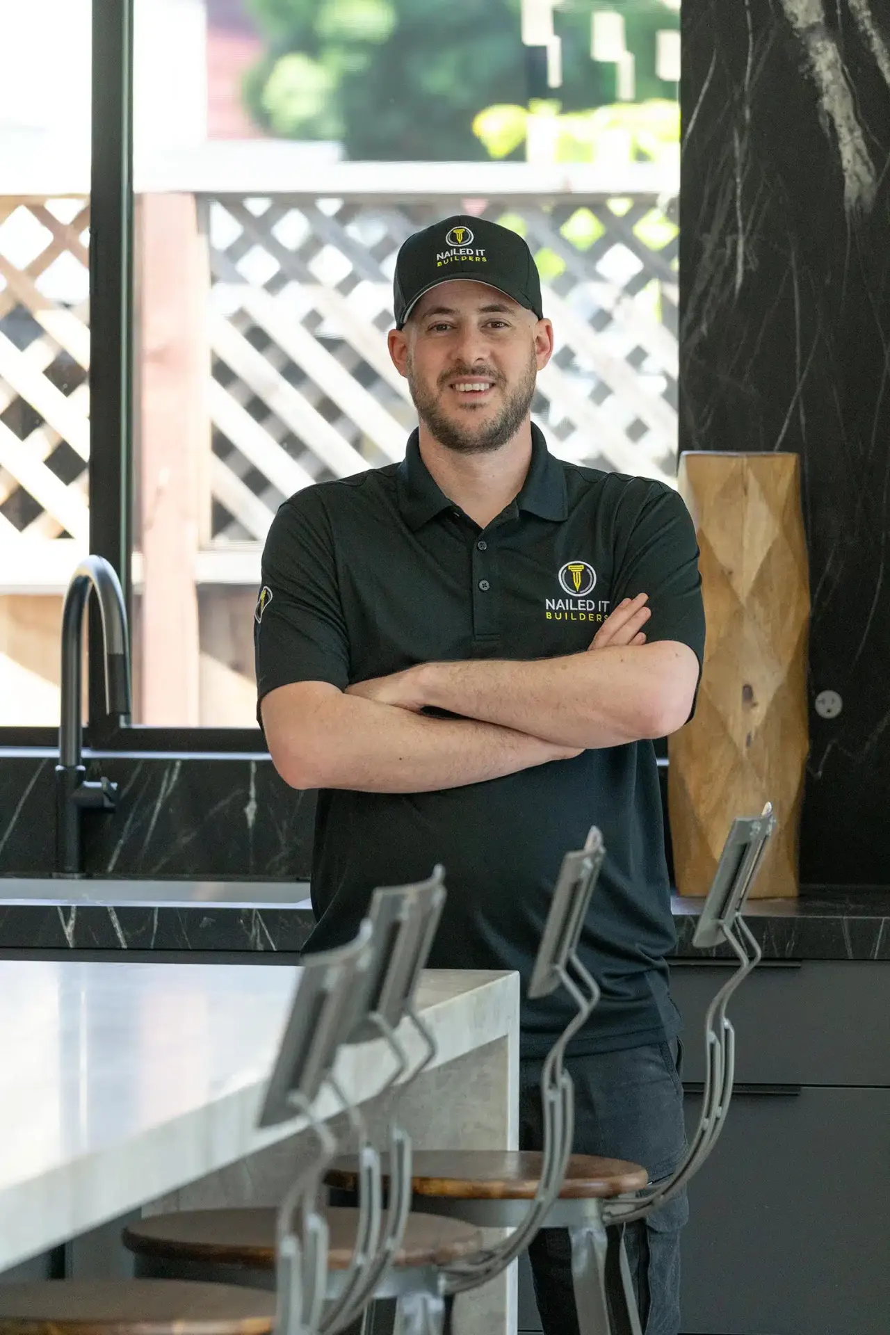 Joseph Malka of Nailed It Builders in a completed kitchen remodel